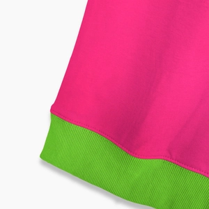 Vibrant rose pink long sleeve sweatshirt with contrasting green ribbed hem detail
