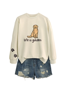 Detail of life is golden golden retriever print on cream sweatshirt with paw sleeve patterns