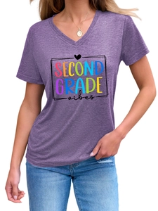 Close-up of purple V-neck T-shirt with Second Grade Vibes colorful graphic print