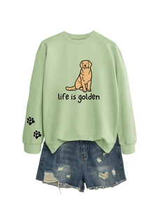 Detail of light green sweatshirt with golden retriever print and life is golden text