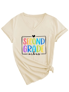 Detail of cream V-neck T-shirt featuring Second Grade vibes print and side-tie knot hem