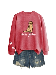 Detail of life is golden golden retriever print and heart paw on red sweatshirt sleeve