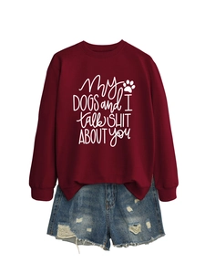 Detailed close-up of burgundy crewneck sweatshirt with My Dogs and I talk Shit print