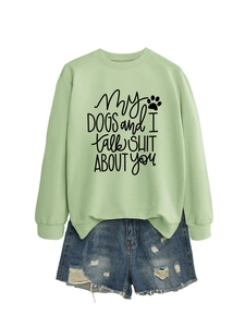 Light green graphic sweatshirt with My Dogs and I Talk Shit text and ripped denim shorts