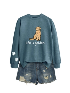 Detail of blue crewneck sweatshirt featuring golden retriever print and life is golden text