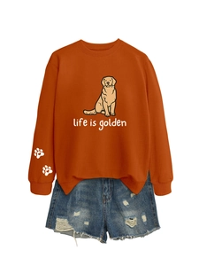 Detail of rust orange sweatshirt with golden retriever print and life is golden text