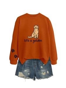 Detail of orange sweatshirt with Golden Retriever print and sleeve heart paw embroidery