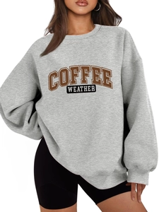 Close-up of Coffee Weather print on thick grey sweatshirt with drop shoulder seams