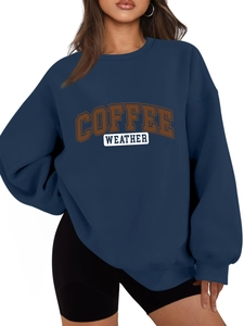 Detail of navy blue sweatshirt with vintage coffee weather print and soft fabric texture