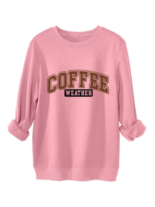 Detail of pink cotton sweatshirt featuring Coffee Weather vintage lettering and ribbed cuffs