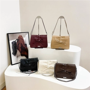 Minimalist glossy PU leather shoulder bag with chic bow and silver chain in five colors