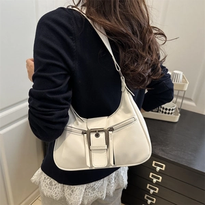 White minimalist underarm bag with vintage metal buckle and decorative side zippers