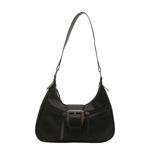 Retro black faux leather crescent shoulder bag with metal buckle and long tassels