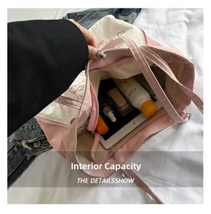 Detail view of the spacious internal capacity with compartments for tablet and essentials