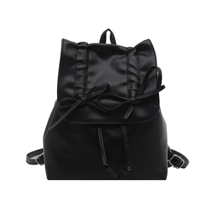 Minimalist black PU leather backpack with decorative bows and drawstring closure