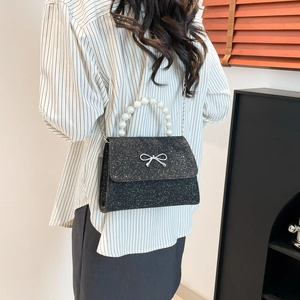 Funkelnde schwarze Pailletten-Handtasche mit Perlengriff und silberner Schleife für Damen