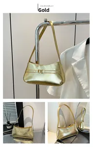 Detailed views of gold mirror finish underarm bag with chic buckle and sleek strap