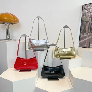 Chic glossy PU leather underarm bags in four colors on elegant geometric pedestals