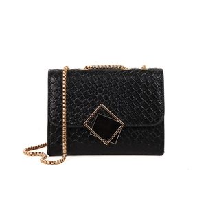 Minimalist black woven shoulder bag with gold square buckle and snake chain strap