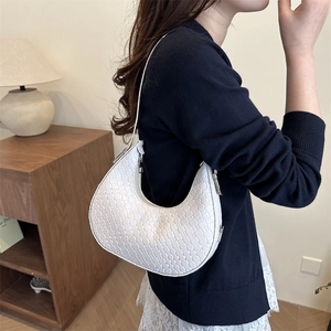 White woven crescent armpit bag for women with elegant PU leather texture and shoulder strap