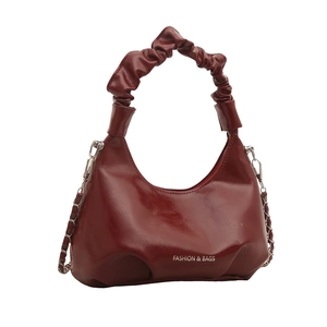 Minimalist burgundy scrunched handle handbag with metallic chain for women