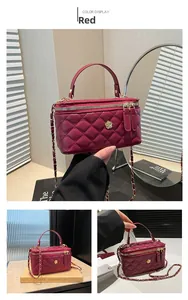 Detail of red quilted box bag with gold camellia ornament and leather chain strap