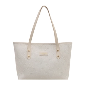 Chic beige tote bag featuring floral 3D embroidery and leather handles for daily use