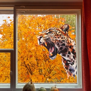 Detailed roaring leopard glass window sticker with realistic fur texture and autumn theme