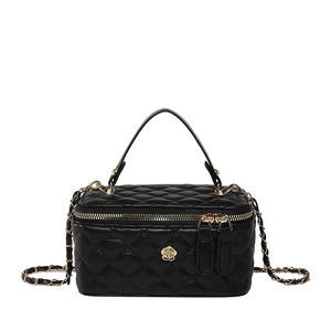 Elegant black quilted box bag with gold floral clasp and chain strap on white background