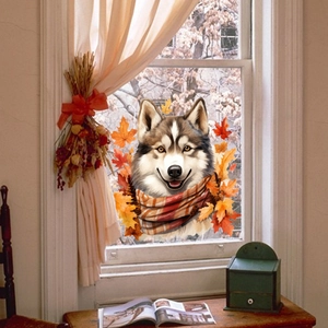 Detail of cute husky dog window sticker with autumn maple leaves on glass surface