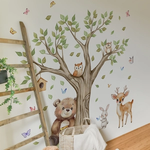Watercolor forest wall stickers with bear, deer, and tree displayed on a white wall