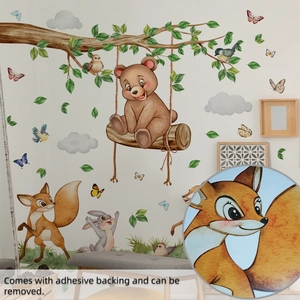 Detail of cartoon fox wall sticker showing watercolor texture and adhesive backing quality