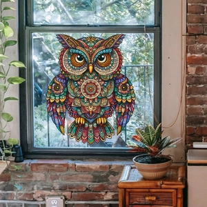 Detailed view of colorful mandala owl window sticker with vibrant geometric patterns