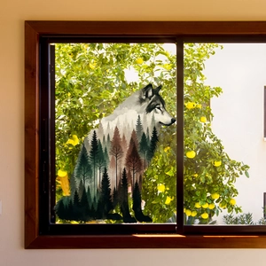 Artistic double exposure wolf silhouette window sticker with forest landscape and mountains
