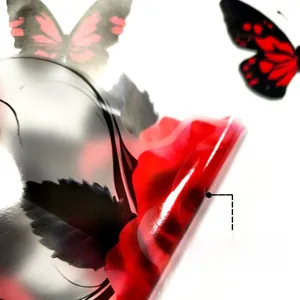Macro shot showing self-adhesive backing of red rose wall stickers with removable feature