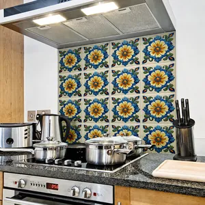 Detailed view of vintage floral tile stickers applied on a kitchen backsplash wall