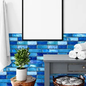 Close-up of blue marble-pattern subway tile stickers in a modern bathroom setup