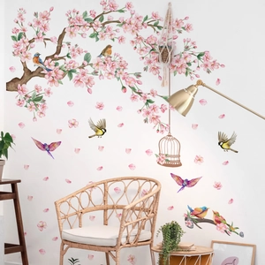 Watercolor wall stickers featuring pink cherry blossoms, birds, and a vintage birdcage
