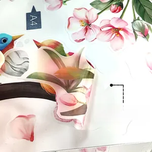 Detail of self-adhesive floral wall sticker showing easy peel backing in A4 size