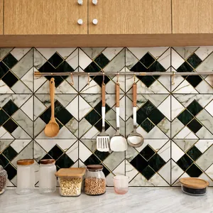Waterproof kitchen backsplash tiles featuring marble textures and gold geometric lines