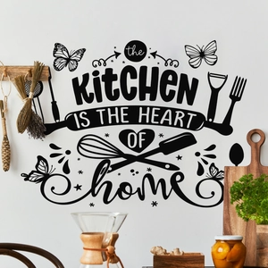 Black kitchen wall decal with silhouette utensils and heart of home quote on white wall