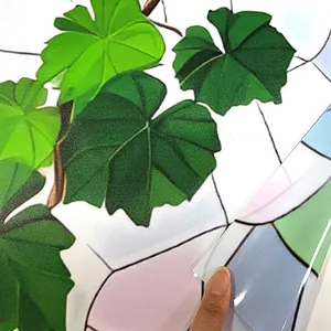 Static cling window film with green vine pattern and double-sided colored design
