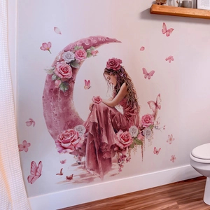 Detail showing a watercolor girl on a crescent moon wall sticker with pink butterflies