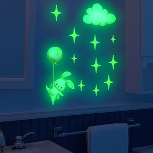 Glow-in-the-dark wall decals featuring a cute bunny holding a balloon and stars