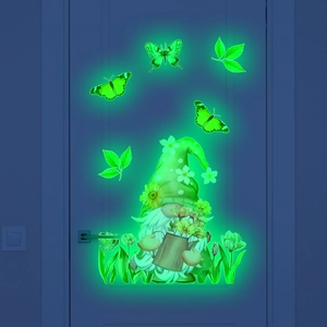 Glow-in-the-dark gnome wall sticker set featuring green luminous butterflies and floral elements