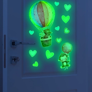 Glow in the dark wall stickers featuring hot air balloon and animals for nursery room
