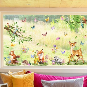 Watercolor forest animal window decals featuring deer, fox and branches on glass