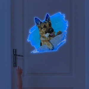 Luminous German Shepherd wall sticker glowing in dark on a white door in a bedroom