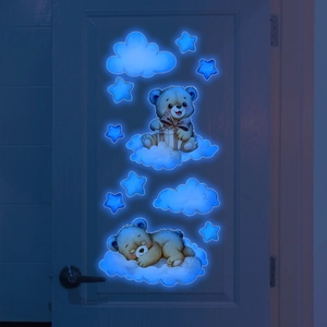 Luminous blue glow wall stickers featuring cartoon bears on clouds and stars at night