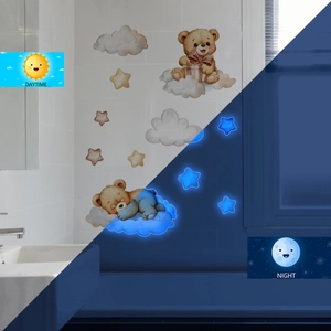 Luminous blue cartoon bear and stars wall decals showing day and night glowing effect
